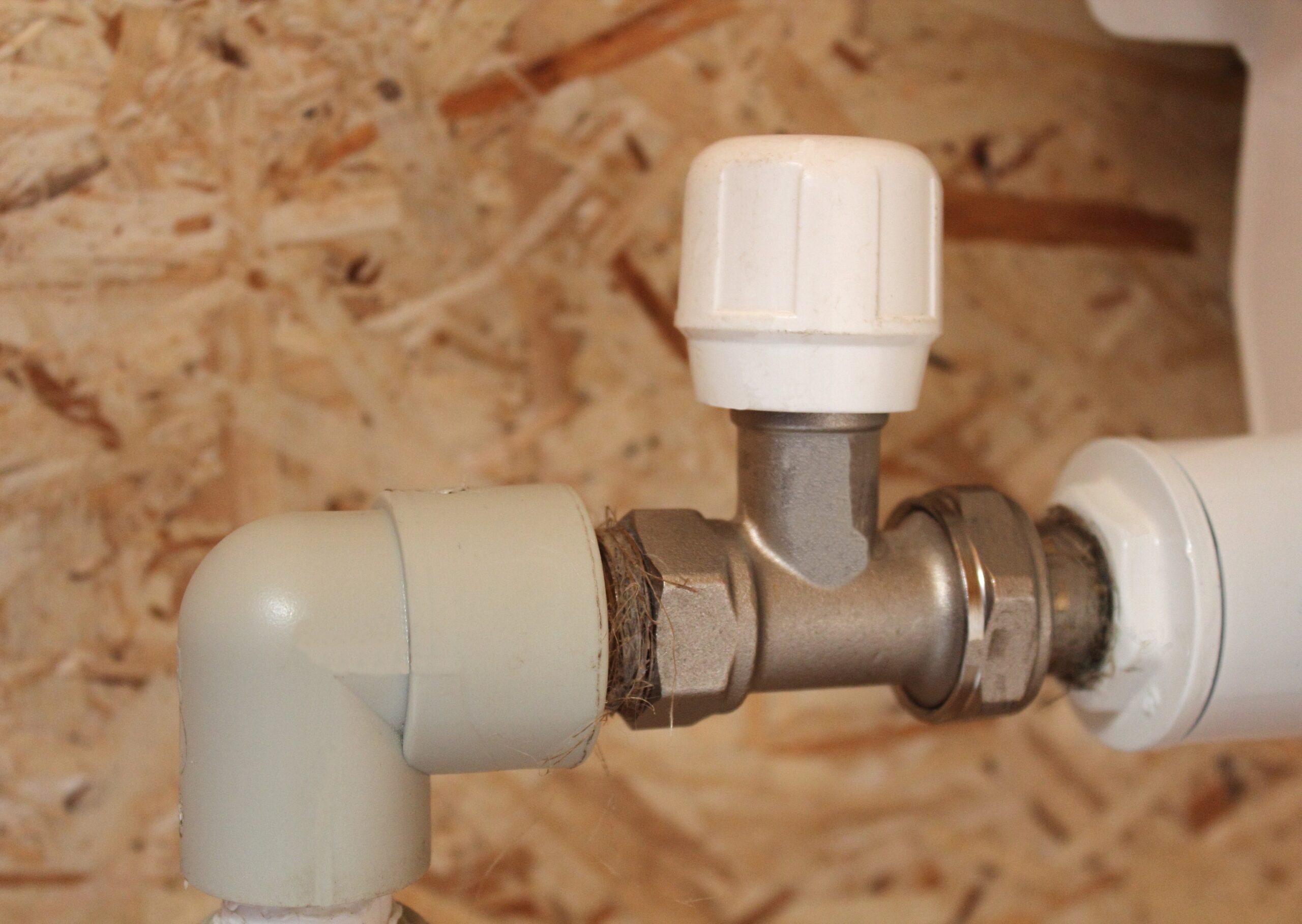 close-up-heating-radiator-valve-and-heating-pipes-2024-11-26-23-31-38-utc